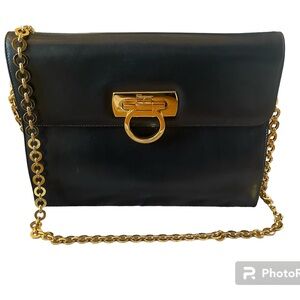 Salvatore Ferragamo. Black Leather Bag with Gold Chain.
